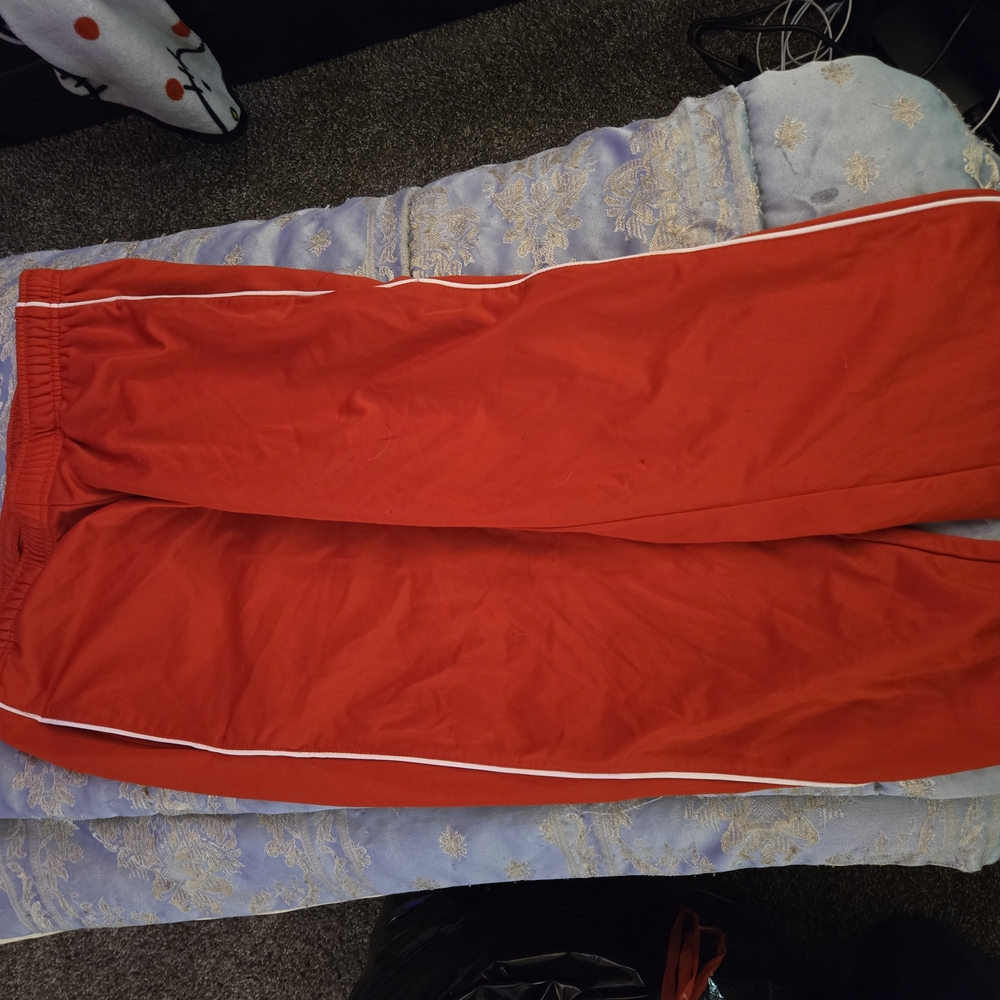 Red Track Pants with White Stripes
